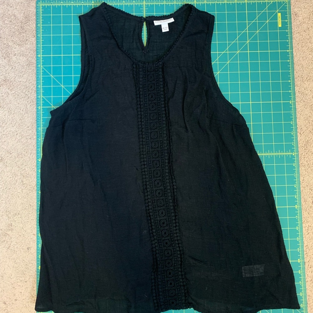 Black gauze maternity top with crochet details.